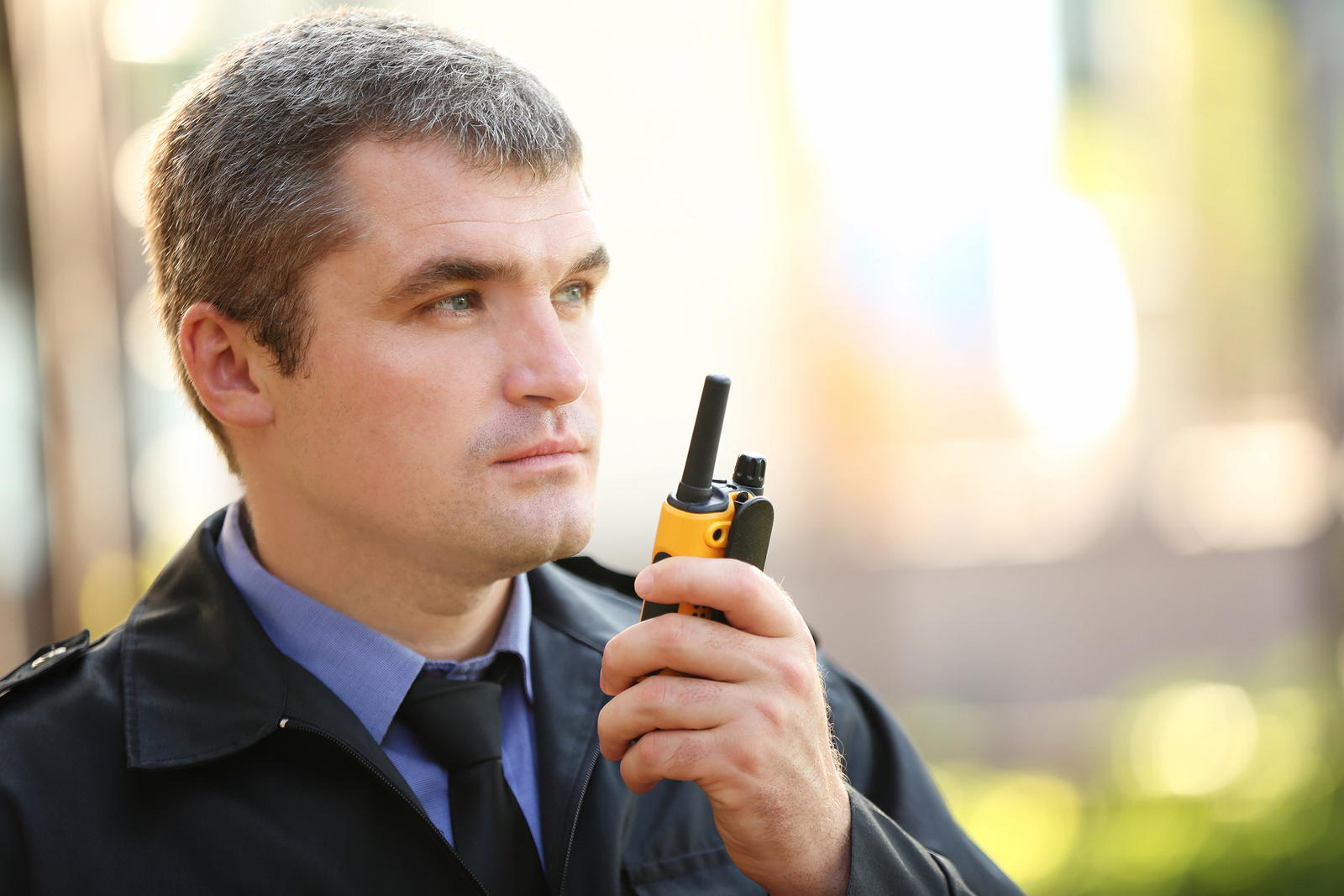 bigstock-Male-security-guard-on-light-b-158819474