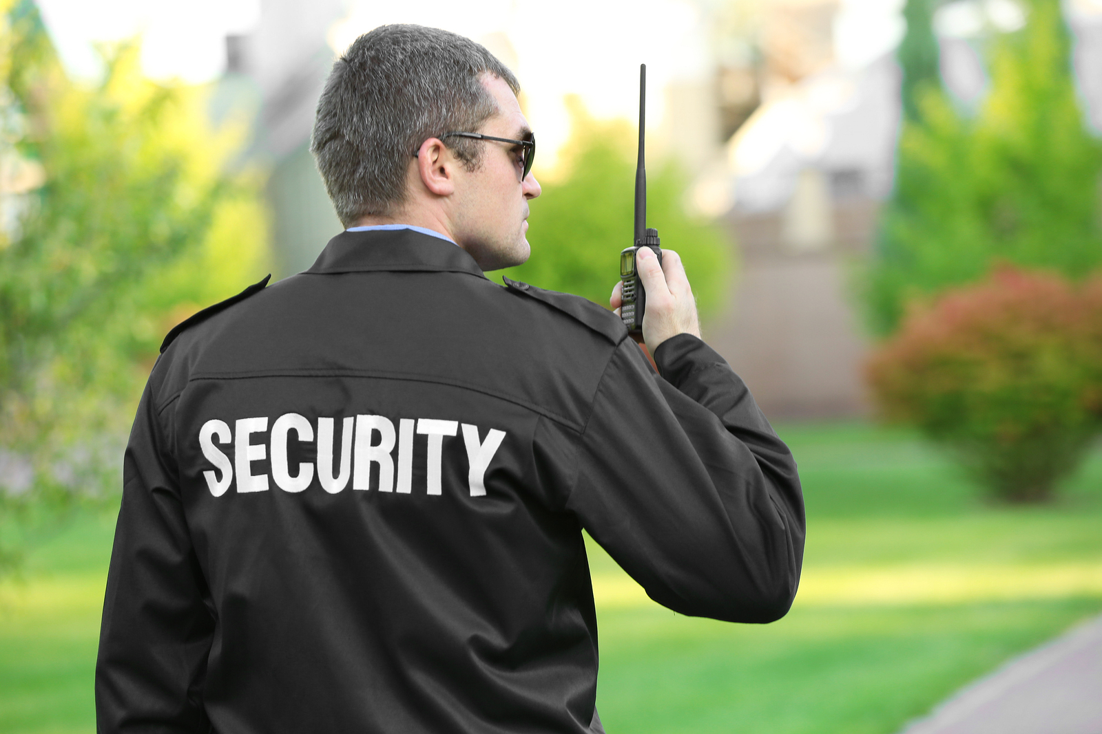 bigstock-Male-security-guard-in-park-158811245